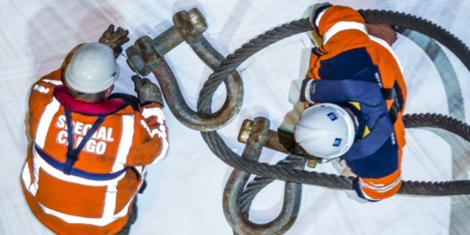 Men working with steel cable